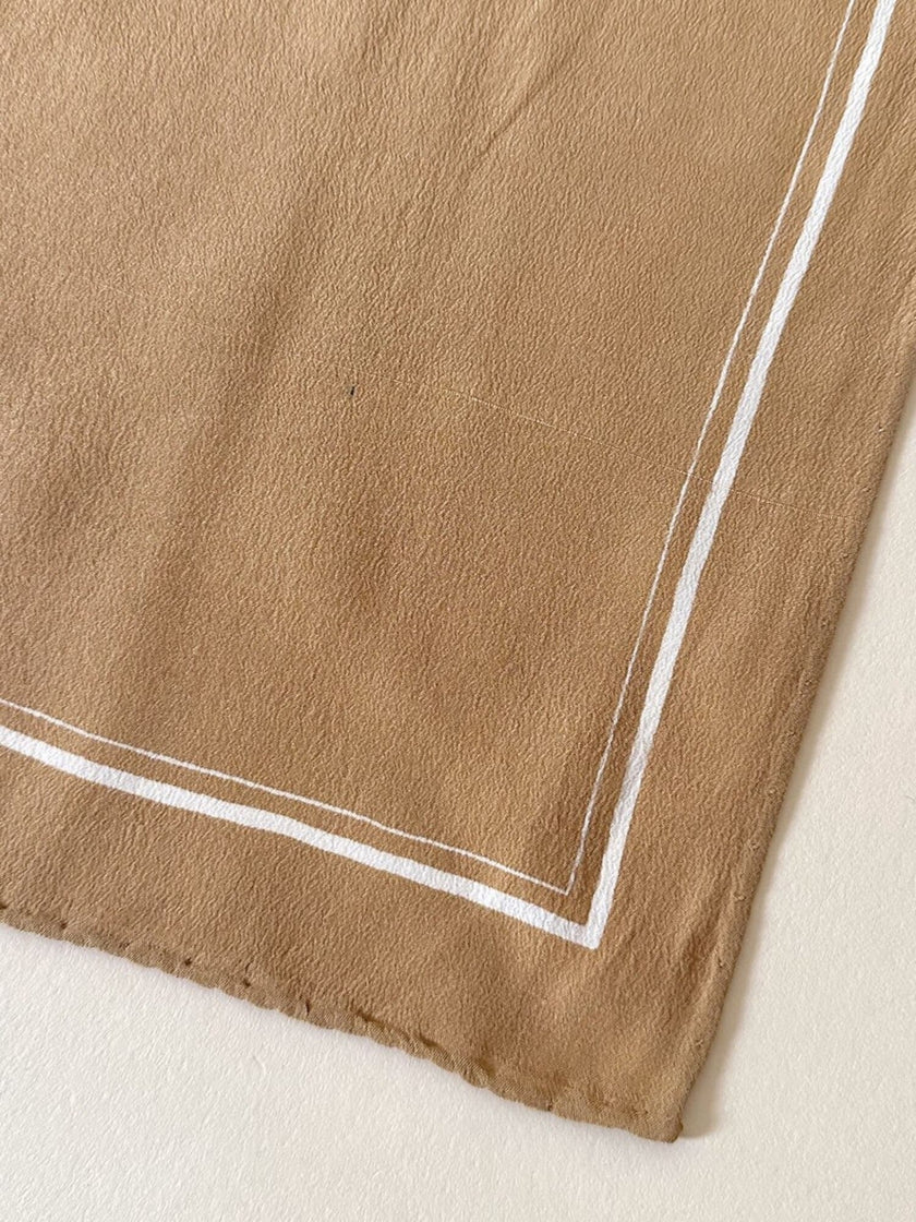 Foulard vintage Yves Saint Laurent in seta biscotto con profili e logo bianchi