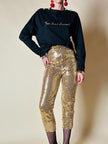 Maglia in cotone nero con bottoni dorati “Yves Saint Laurent”