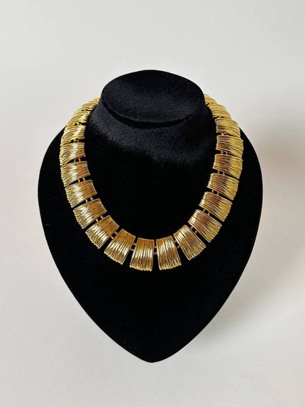 Collier vintage oro con elementi geometrici striati