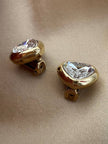 Clip dorate a forma di cuore con strass centrale