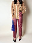 Pantalone in pelle mattone rosato a vita alta con pince e cintura in coordinato La Matta