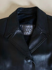 Blazer cropped Gianni Versace vintage in pelle nera con bottoni medusa