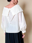 Blusa vintage Yves Saint Laurent bianca con grande balza e rosa nera