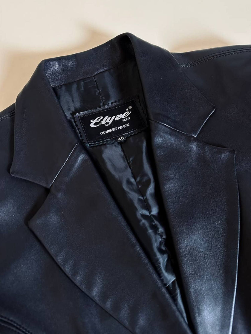 Blazer vintage in pelle nera Elizé Paris sciancrato con bottoni ricoperti in pelle