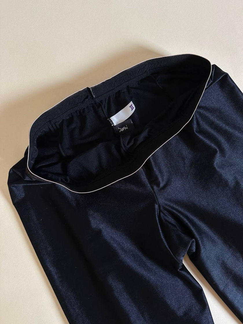 Collant vintage Yves Saint Laurent in lycra lucida nera con elastico logato