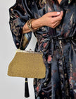 Borsa vintage Art Déco in lamé oro intrecciato con chiusura gioiello e nappa couture