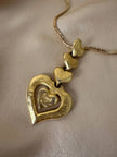 Collana dorata con ciondolo pendente a cuoricini “Yves Saint Laurent”