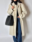 Secchiello vintage Yves Saint Laurent in tessuto nero millerighe con riporti in pelle