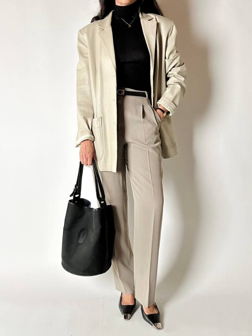 Secchiello vintage Yves Saint Laurent in tessuto nero millerighe con riporti in pelle