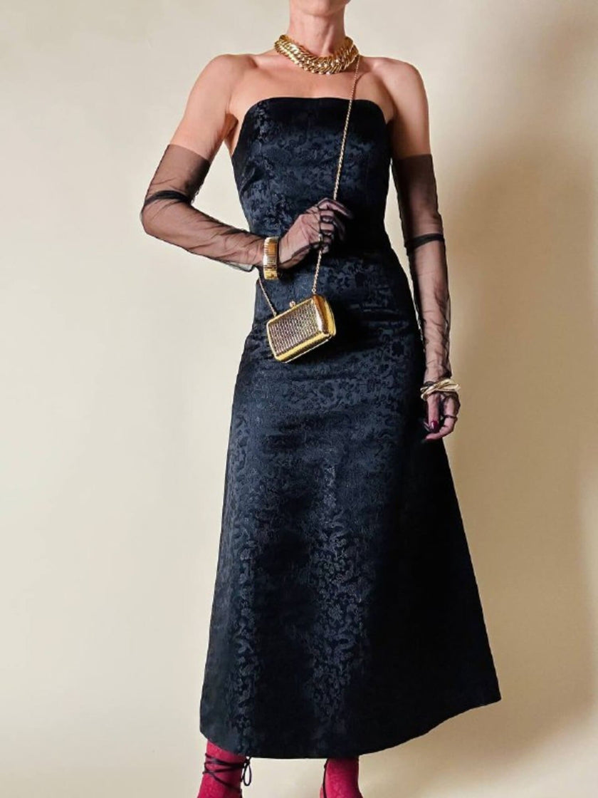 Mini clutch in metallo oro con tracolla in catena