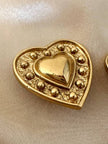Clip dorate a forma di cuore “Yves Saint Laurent”
