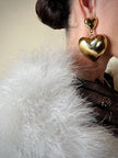 Maxi clip oro con cuori pendenti “Moschino”