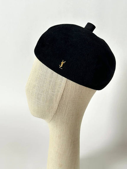 Mini spilla vintage logo Yves Saint Laurent in metallo dorato