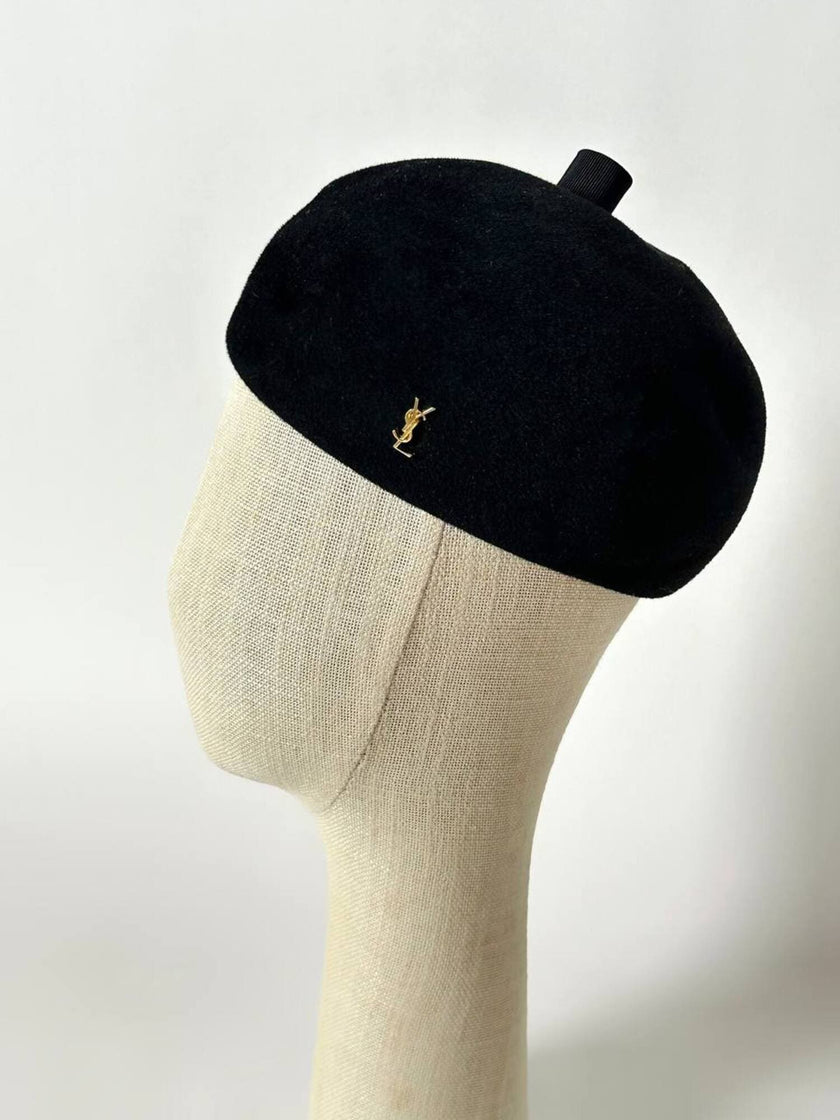 Mini spilla vintage logo Yves Saint Laurent in metallo dorato