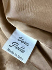 Vintage tan leather jacket with hand-stitched detailing by Claude Collections