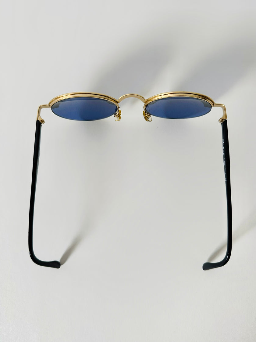 Occhiali da sole vintage Oliver Valentino con montatura gioiello dorata e lenti blu