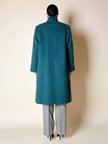 Cappotto doppiopetto in lana bouclé verde bosco con fodera firmata