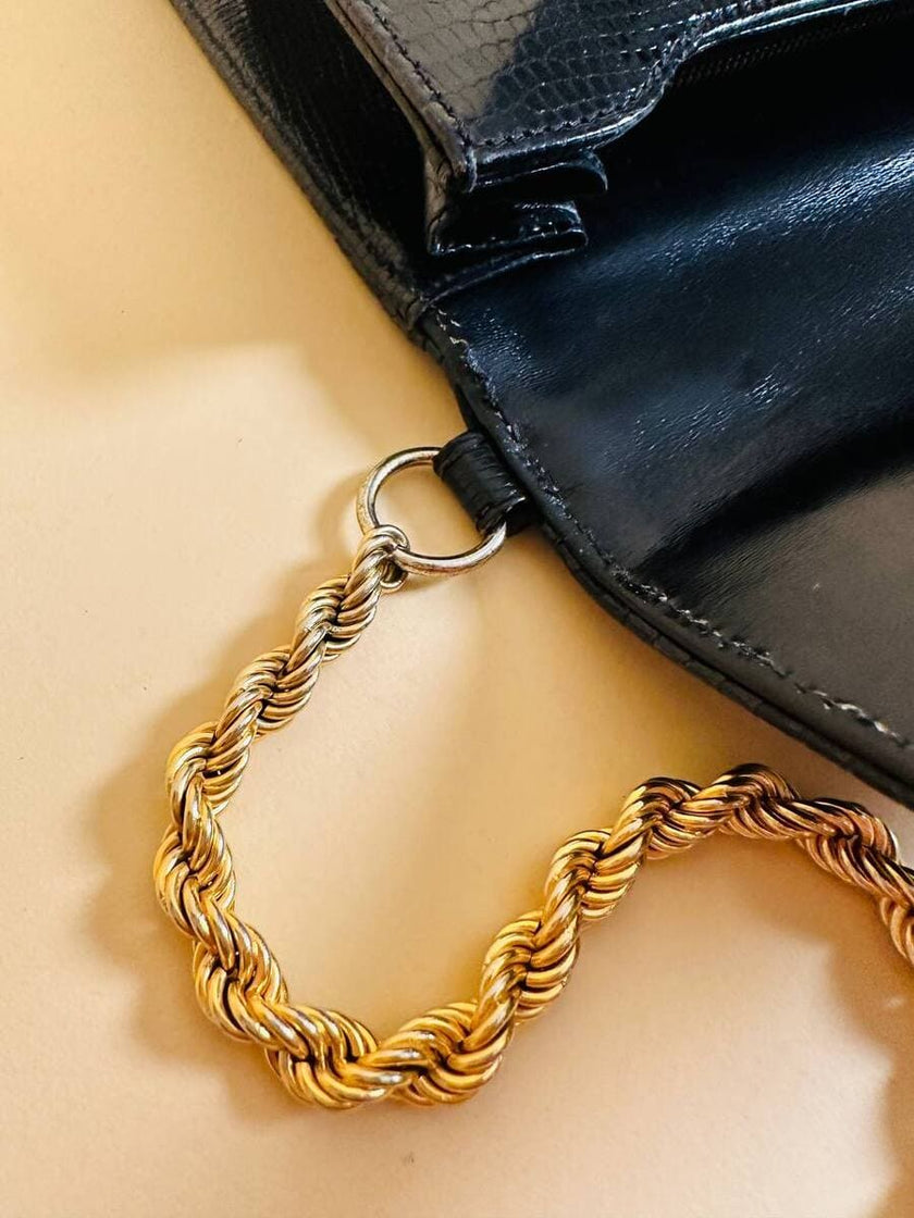 Borsa in pelle nera in stampa tejus 