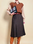 Gilet in lana color tabacco con motivo a trecce