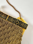 Borsa vintage Art Déco in lamé oro intrecciato con chiusura gioiello e nappa couture