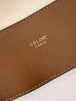 Cintura Celine in pelle color cuoio con fibbia rotonda in metallo dorato