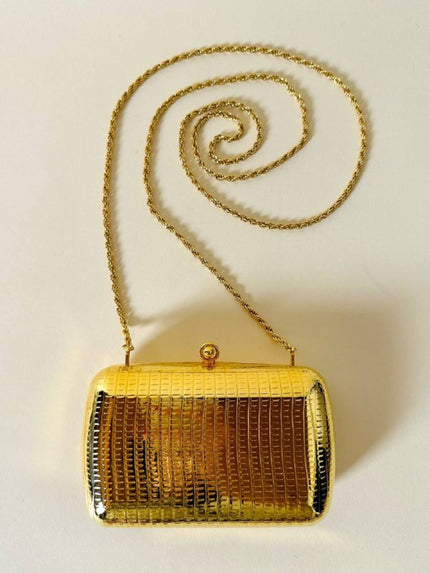 Mini clutch in metallo oro con tracolla in catena