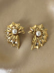 Clip dorate a forma di conchiglia con perle cabochon