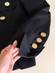 Blazer nero con bottoni gioiello dorati “Yves Saint Laurent”
