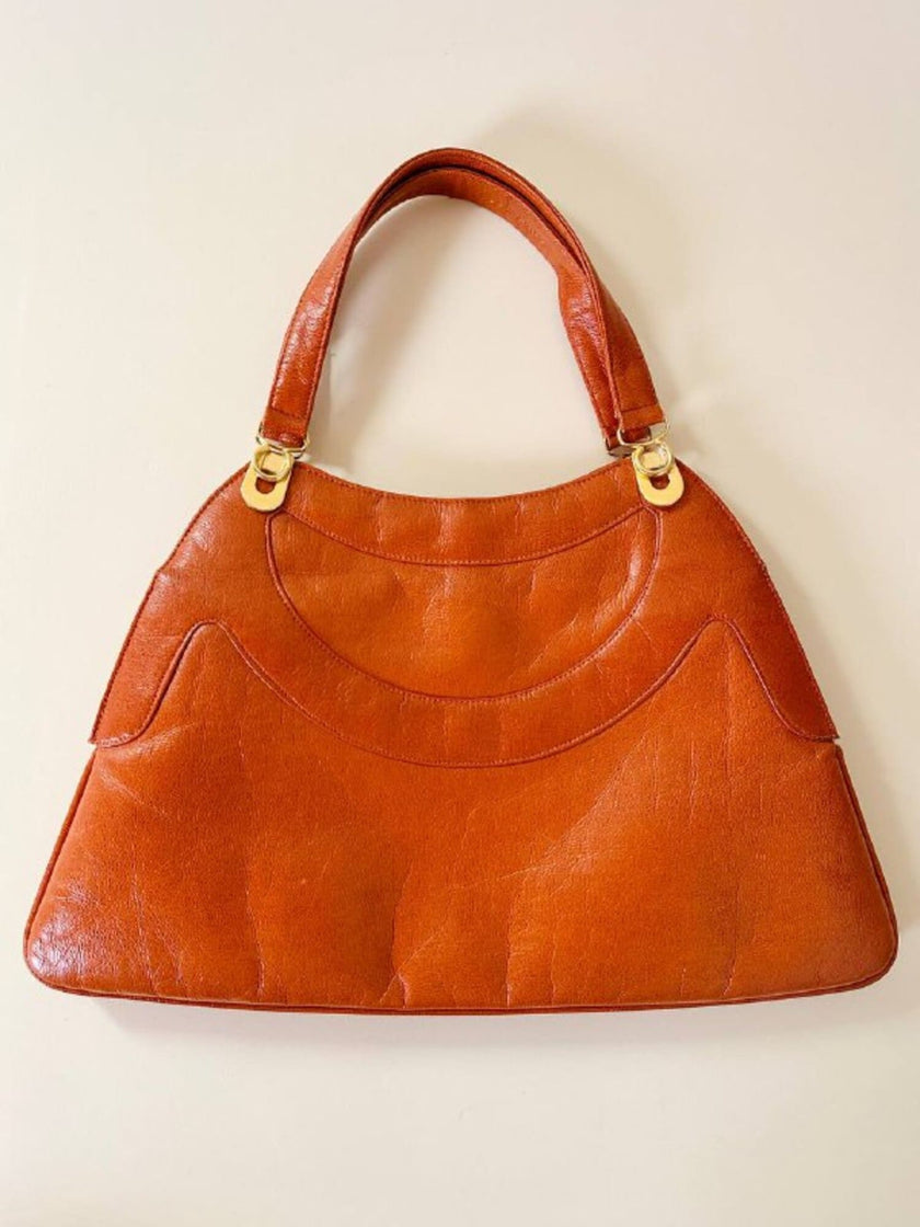 Borsa in pelle arancione zucca con doppi manici e hardware oro