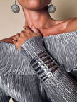 Manchette in metallo scavato argento “Thierry Mugler”