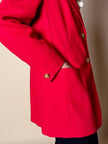 Blazer rosso con bottoni dorati a forma di cuore “Mondì”