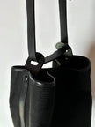 Secchiello vintage Yves Saint Laurent in tessuto nero millerighe con riporti in pelle