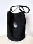 Secchiello vintage Yves Saint Laurent in tessuto nero millerighe con riporti in pelle