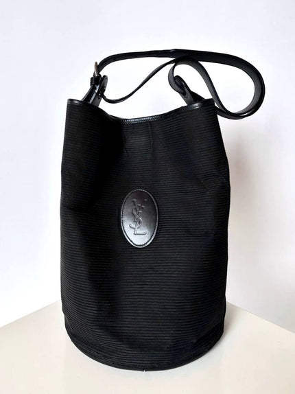 Secchiello vintage Yves Saint Laurent in tessuto nero millerighe con riporti in pelle