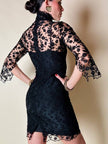 Mini abito sartoriale in tulle nero con ricami floreali