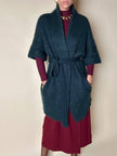 Cardigan Carven in lana verde con manica a tre quarti e cintura in vita