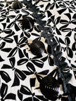 Giacca in cotone piquet bianco con fantasia a fiocchi neri “Yves Saint Laurent”