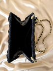 Sac bandoulière en osier et raphia noir avec bandoulière chaîne dorée