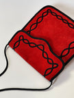 Borsa vintage Yves Saint Laurent in camoscio rosso con passamaneria nera