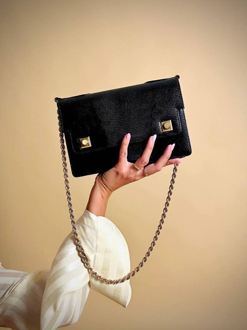 Borsa in pelle nera in stampa tejus 
