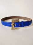 Cintura vintage Yves Saint Laurent in pelle bluette con fibbia gioiello dorata
