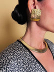 Maxi clip oro con logo “Yves Saint Laurent”