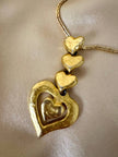Collana dorata con ciondolo pendente a cuoricini “Yves Saint Laurent”