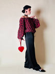 Blusa in seta nera con bocche e cuori rossi “Yves Saint Laurent”