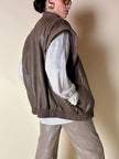 Bomber con maniche rimovibili in pelle color fango “Arpell”