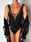 Costume intero nero con inserti in tulle e lavorazione a rilievo