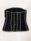 Bustier vintage Yves Saint Laurent en tissu noir agrémenté d'un galon serpentin en lamé doré