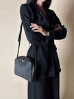 Borsa Bandoulière vintage Yves Saint Laurent in tessuto nero plastificato con riporti in pelle