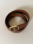 Vintage Yves Saint Laurent tan leather belt with an octagonal enamel buckle and YSL logo