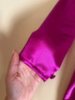Wrap dress in raso ciclamino con cintura in coordinato “Sartoria Oriana Neri”